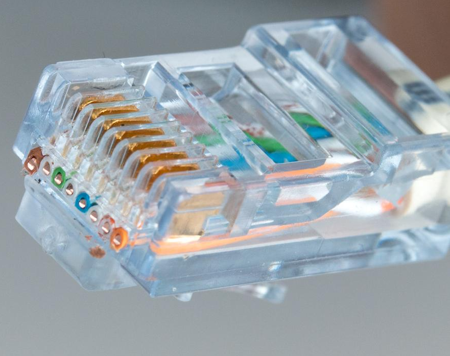 Коннектор сквозной (проходной)  RJ-45 (8P8C) Cat.5e, RIPO, покрытие 3мкд, универ. ножи (упк.20шт)